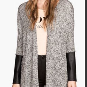 New Divided knit sweater with leather sleeve